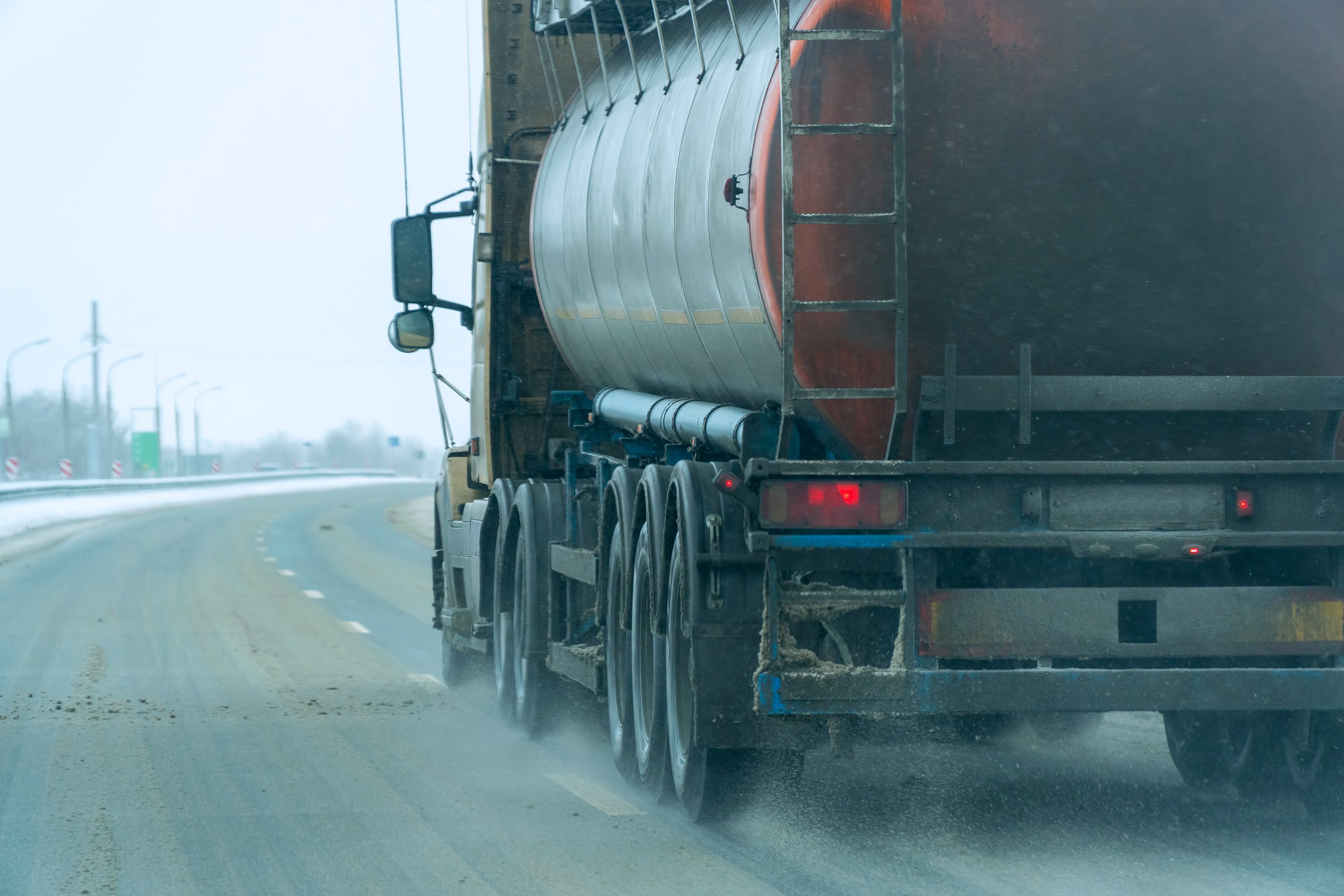 Fuel trucks passing on the winter road